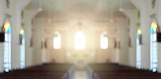 Bishop Slams Brakes After Terror Rap Empty church interior with sunlight at the altar