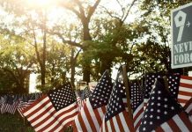 9/11 Bombshell Looms – Trump Holds The Key American flags displayed outdoors at a memorial