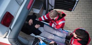 A Routine Food Pickup Turns Into a Nightmare Paramedics load a patient on a stretcher into an ambulance