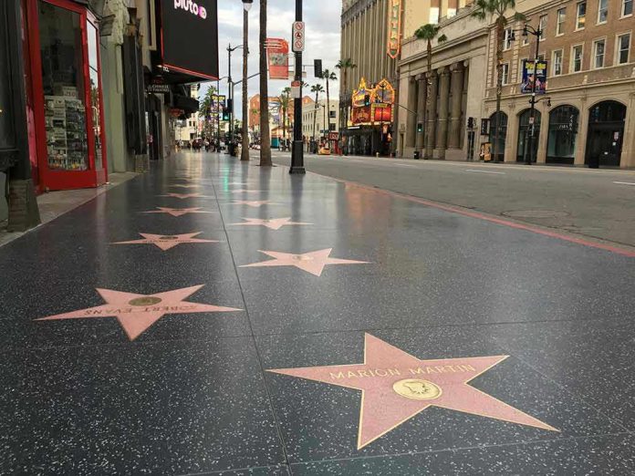1681128400 Hollywood Walk of Fame stars on sidewalk