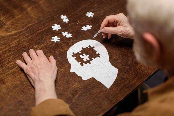 1776503864 Elderly person completing head-shaped jigsaw puzzle