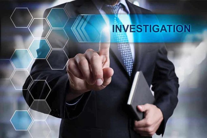 370333907 Man in suit pointing at Investigations text