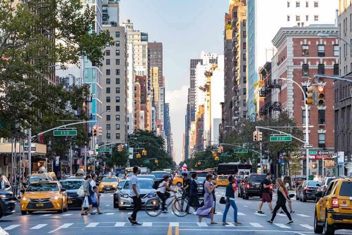788608396 City street with pedestrian crossing and traffic