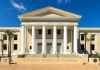 Exterior view of the Supreme Court of Florida with columns and palm trees