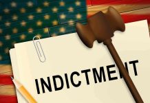 A legal document labeled INDICTMENT with a gavel and pencil